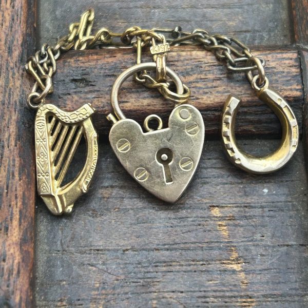 Antique trio of 9ct gold charms