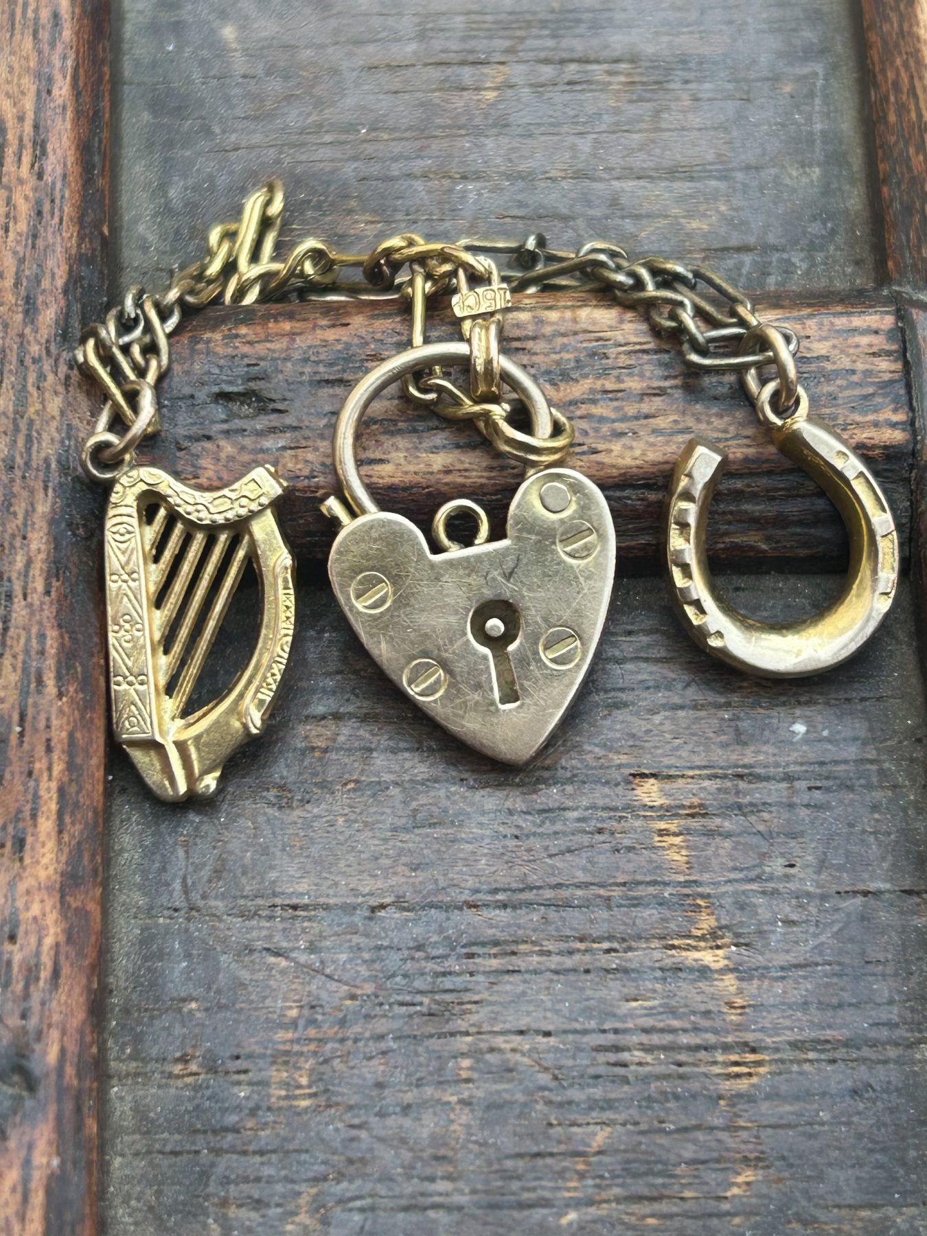 Antique trio of 9ct gold charms