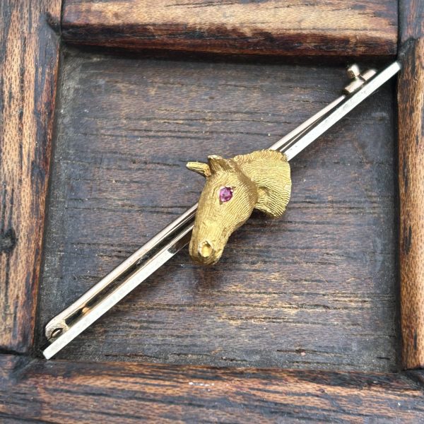 Antique gold horse head stock pin brooch